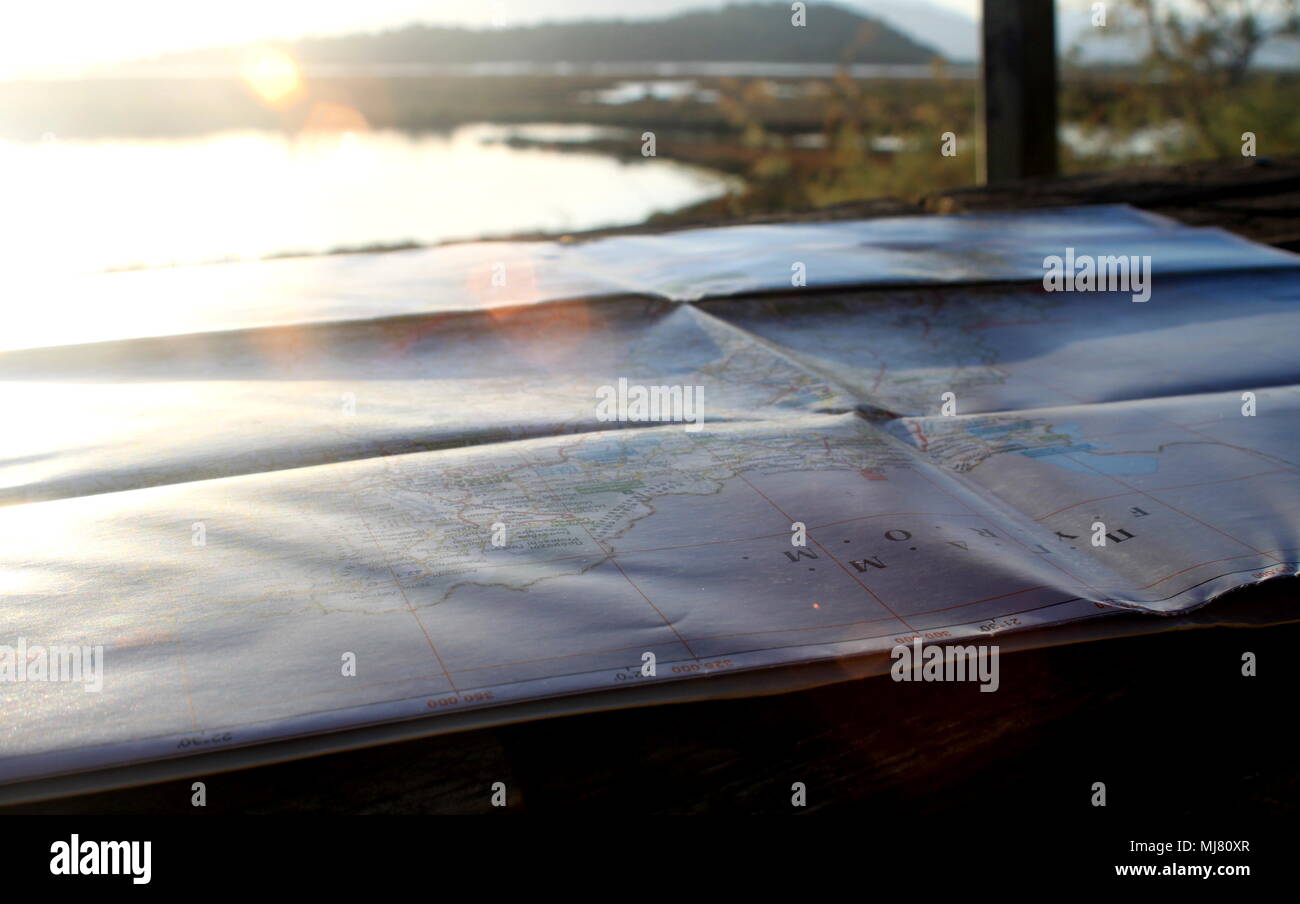 Road map of Greece on a picnic table at the National Park of Amvrakikos Wetlands, Greece Stock Photo