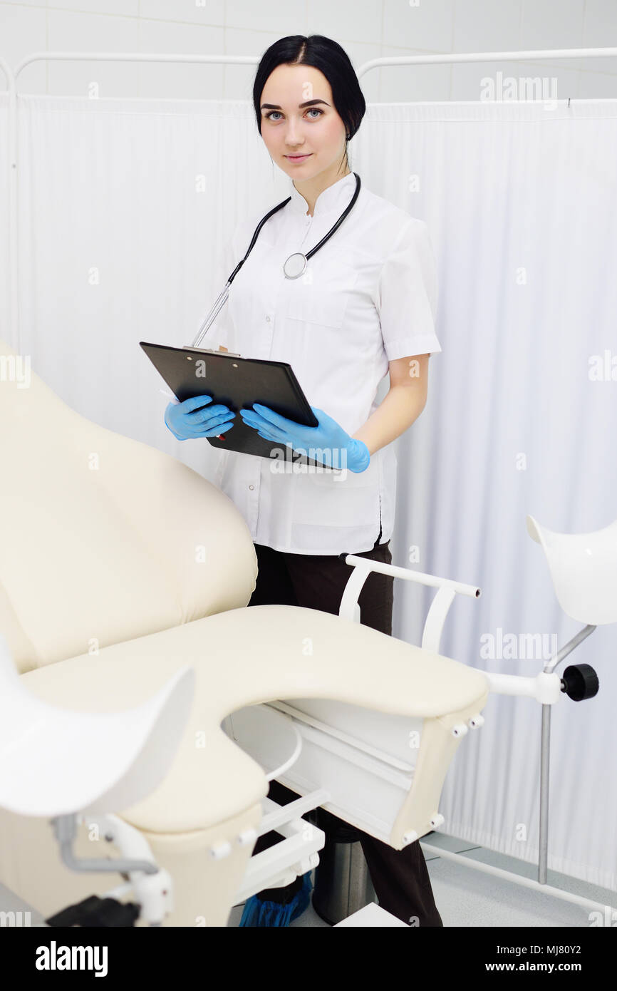 cute young girl doctor obstetrician gynecologist stock photo