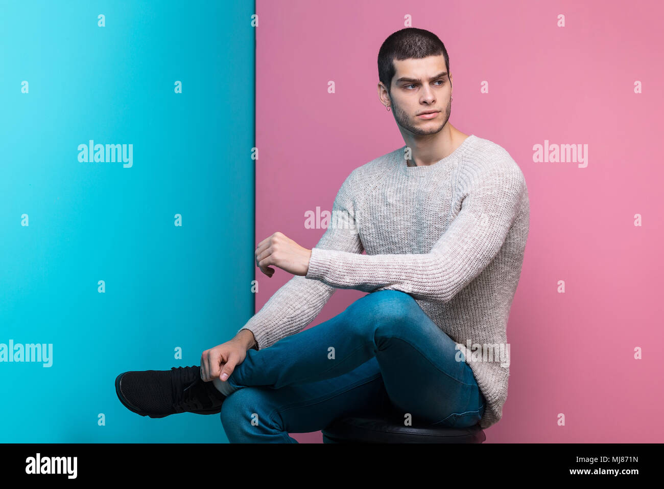 Confident man studio portrait Stock Photo