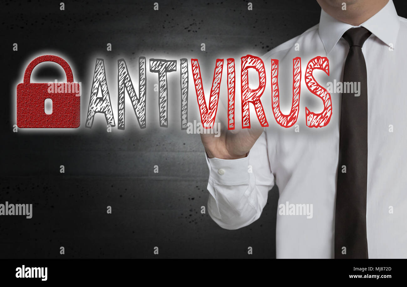 Antivirus is written by businessman on screen. Stock Photo