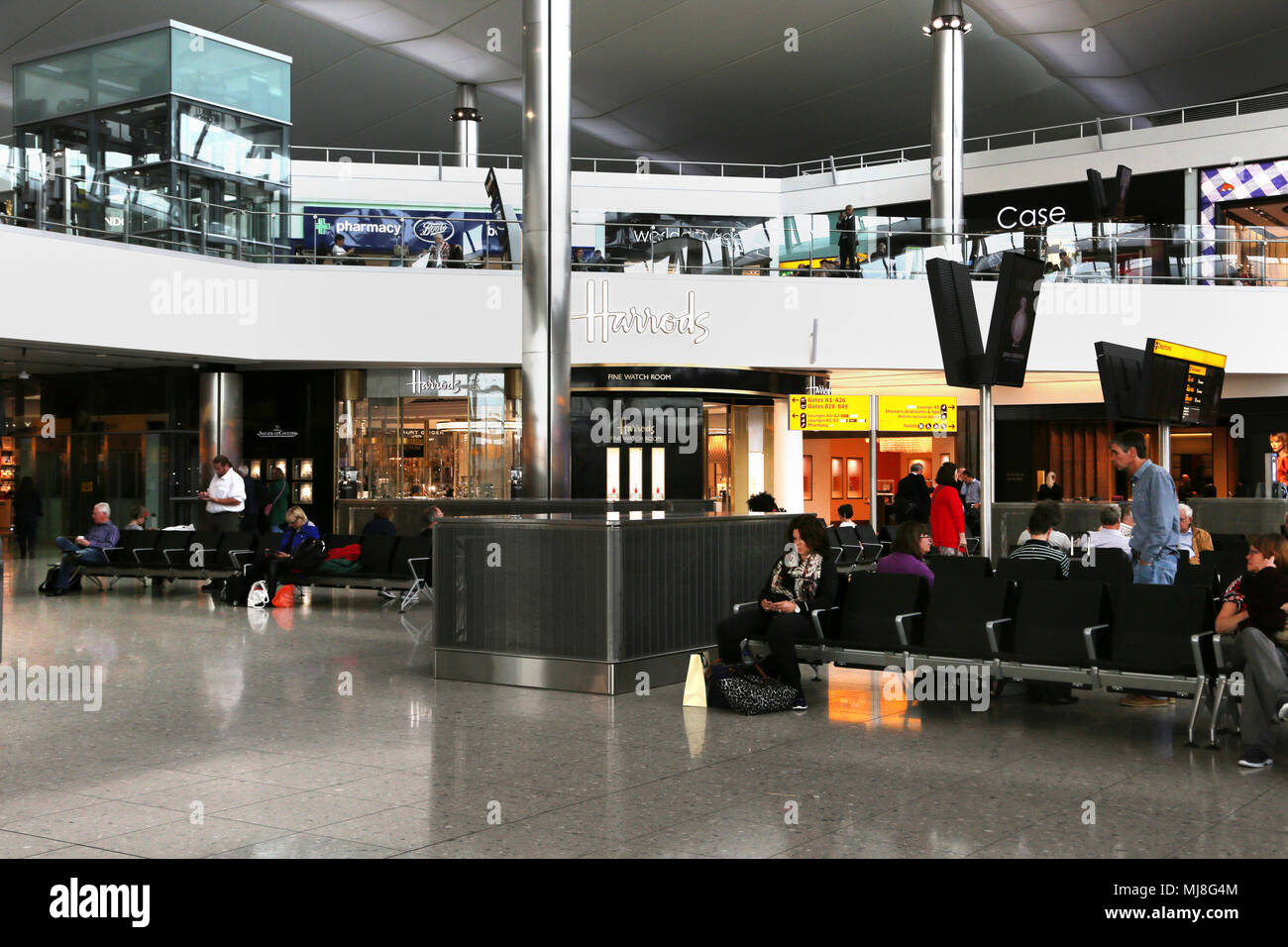 England Heathrow Airport Terminal Two Passengers Waiting For Flights In