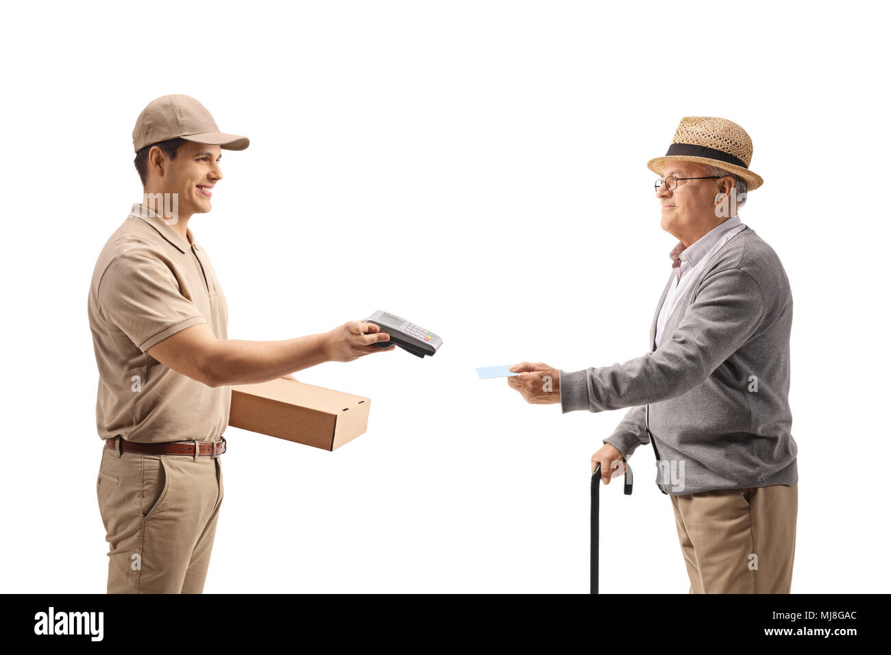 Delivery man holding a package and a payment terminal with a mature man