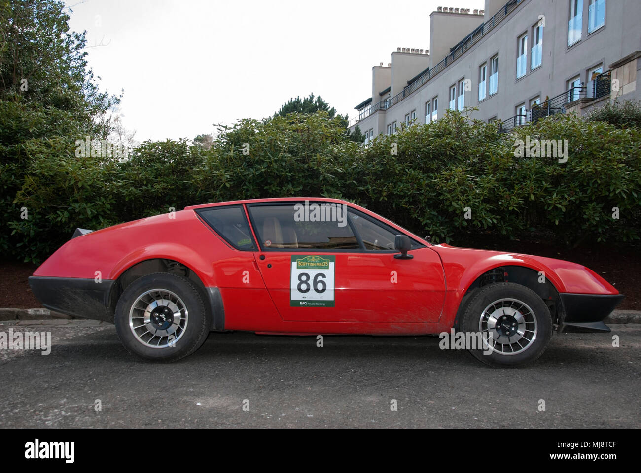 1982 Red Alpine Renault A310 V6 Sports Car right hand passengers side view of 1982 red alpine renault a310 v6 classic french left hand drive 2 two doo Stock Photo