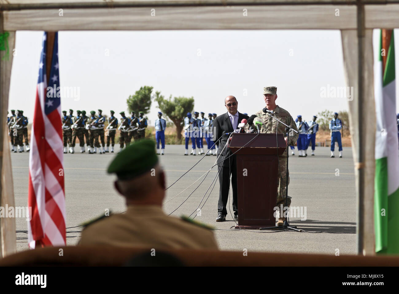 U.S. Air Force Maj. Gen. Marcus Hicks, commander, Special Operations Command Africa, gives remarks during the closing ceremony of Flintlock 2018 in Niamey, Niger, April 20, 2018. Flintlock, hosted by Niger, with key outstations at Burkina Faso and Senegal, is designed to strengthen the ability of key partner nations in the region to counter violent extremist organizations, protect their borders, and provide security for their people. (U.S. Army Photo by Sgt. Heather Doppke/79th Theater Sustainment Command) Stock Photo