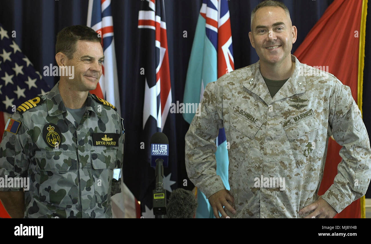 U.S. Marine Corps Col. James Schnelle, commanding officer of Marine Rotational Force-Darwin and Deputy Commander Northern Command CAPT Bryan Parker, Royal Australian Navy hold a press conference at Larrakeyah Defence Precinct, Darwin, Northern Territory, Australia, April 23, 2018. MRF-D was established by former U.S. President Barack Obama and former Australian Prime Minister Julia Gillard in 2011 to build and strengthen partnerships in the Pacific region. Approximately 1,500 Marines are scheduled to participate in training events around the country. (U.S. Marine Corps photo by Cpl. Andrew Pie Stock Photo