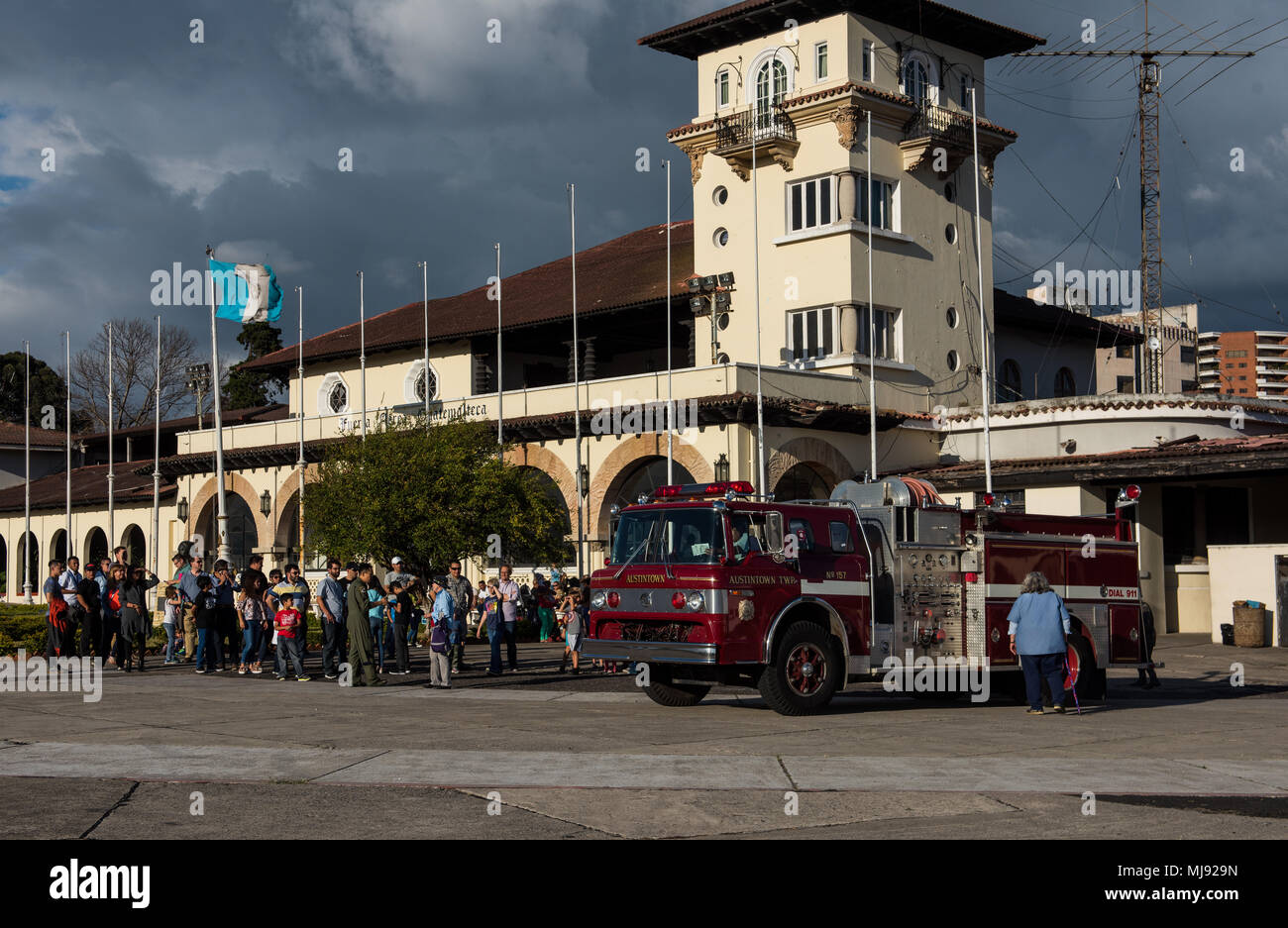 Airmen from the 21st Airlift Squadron, deliver a firetruck at La Aurora International Airport, Guatemala City, Guatemala, April 20, 2018 during a Denton Program mission. The Denton Program is a Department of Defense transportation program that moves humanitarian cargo, donated by U.S. based Non-Governmental Organizations to developing nations to ease human suffering. The emergency vehicles were donated by the Mission of Love Foundation, they are the largest user of the Denton Program, having delivered medical, relief and humanitarian supplies to needy communities throughout the world. (U.S. Ai Stock Photo