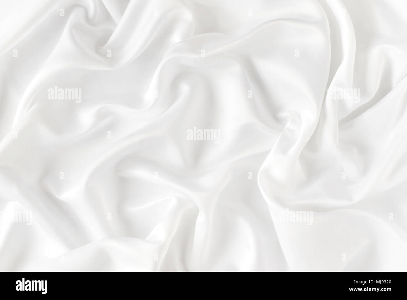 White silk material background hi-res stock photography and images