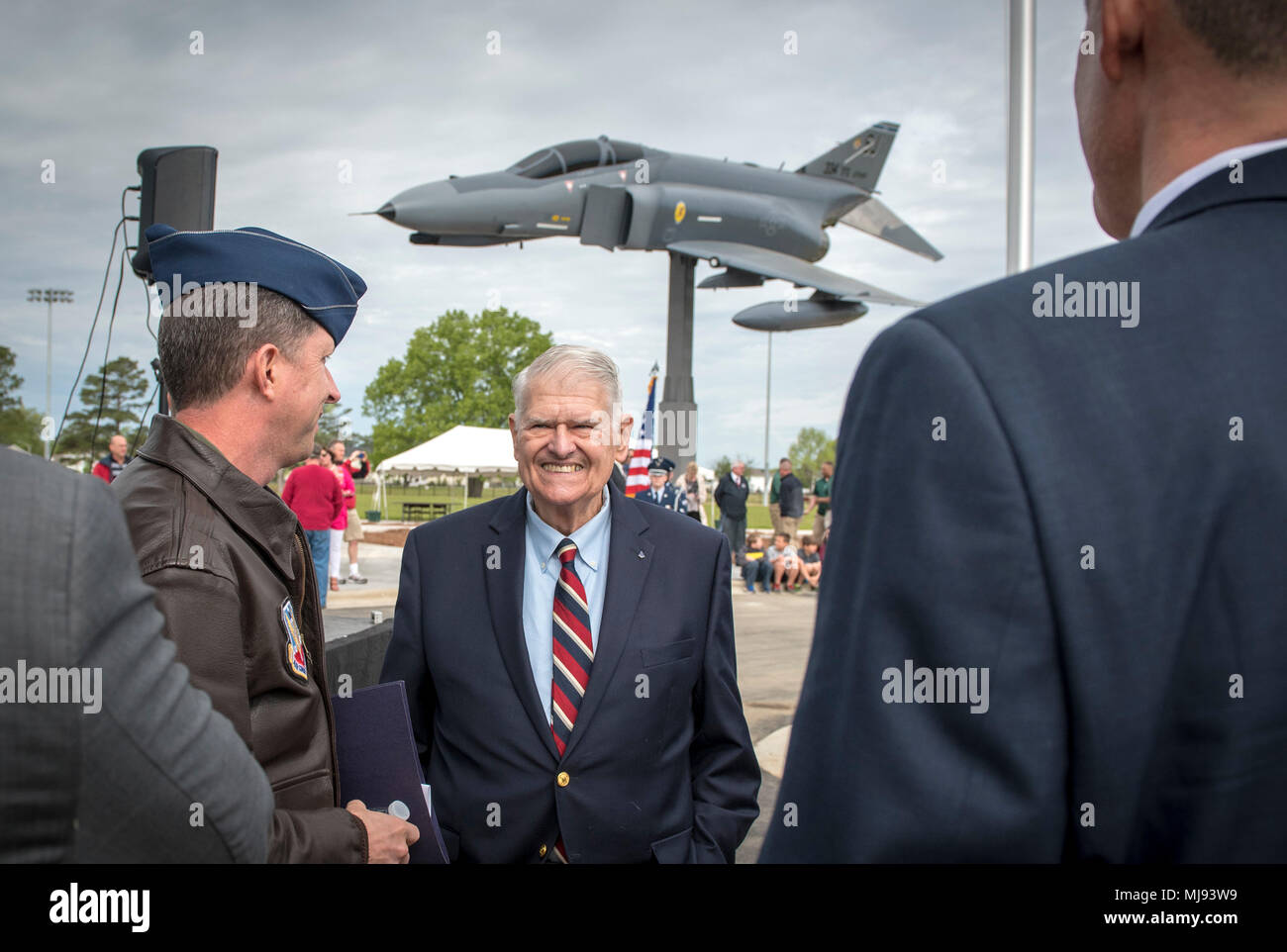 Col. Christopher Sage, 4th Fighter Wing commander, speaks to retired Brig. Gen. Lawrence Huggins before the ribbon-cutting ceremony of the Bryan Multi-Sports Complex in Goldsboro, North Carolina, April 23, 2018. Huggins served as the commander of the 334th Tactical Fighter Squadron and 4th Tactical Fighter Wing at Seymour Johnson Air Force Base, North Carolina.(U.S. Air Force photo by Tech. Sgt. David W. Carbajal) Stock Photo