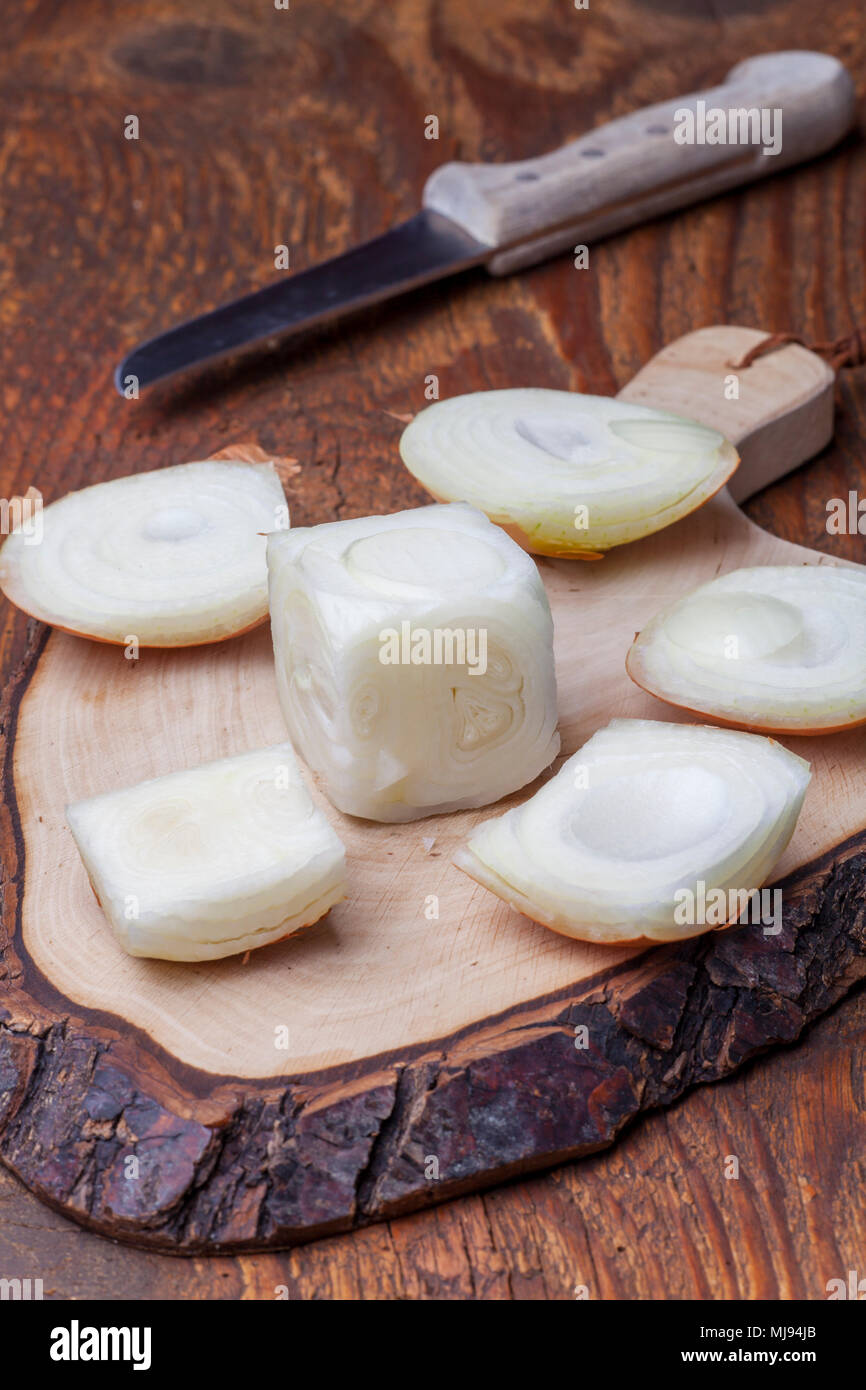 an onion cut into a cube on wood Stock Photo Alamy