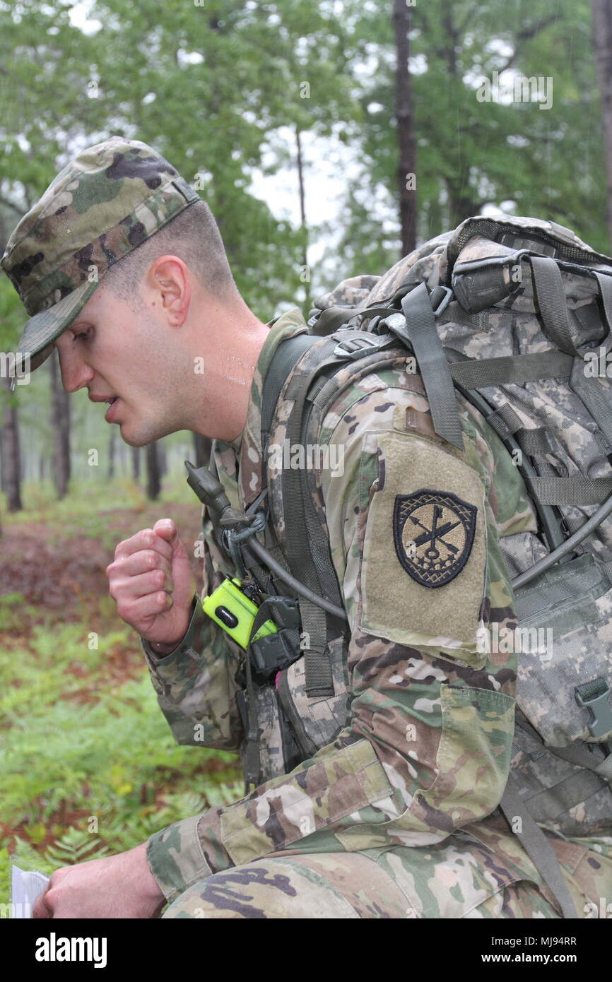 FORT GORDON, Ga. – Spc. Alexander Musarra, Company B, 782nd Military  Intelligence Battalion (Cyber), from Miami, Florida, carries two 40-pound  kettlebell weights during the Army Combat Readiness Test (ACRT) portion of  this