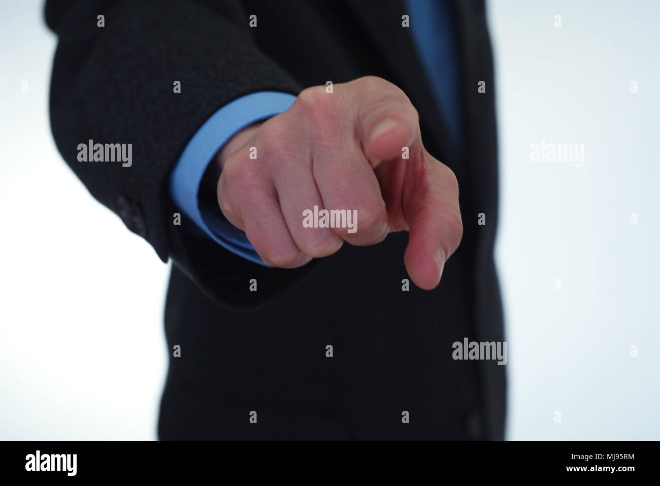 Businessman pointing finger at you Stock Photo
