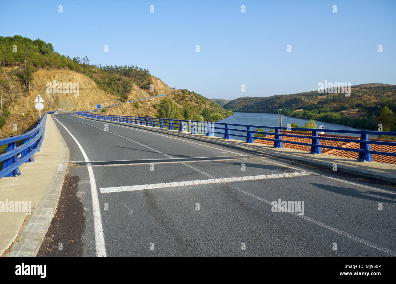 The roadway throught the Lower Guadiana International Bridge over Chanca river connecting southern Spain and Portugal near Pomarao. Beja. Portugal Stock Photo