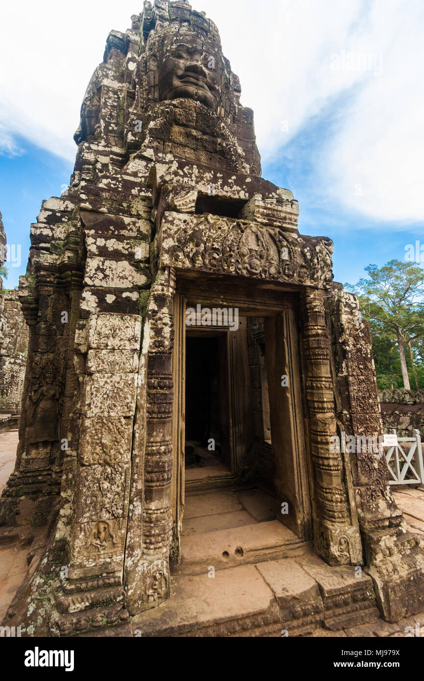 The doorway of one of the structures with the famous monumental stone faces in the third level of Bayon temple in Siem Reap, Cambodia. Stock Photo