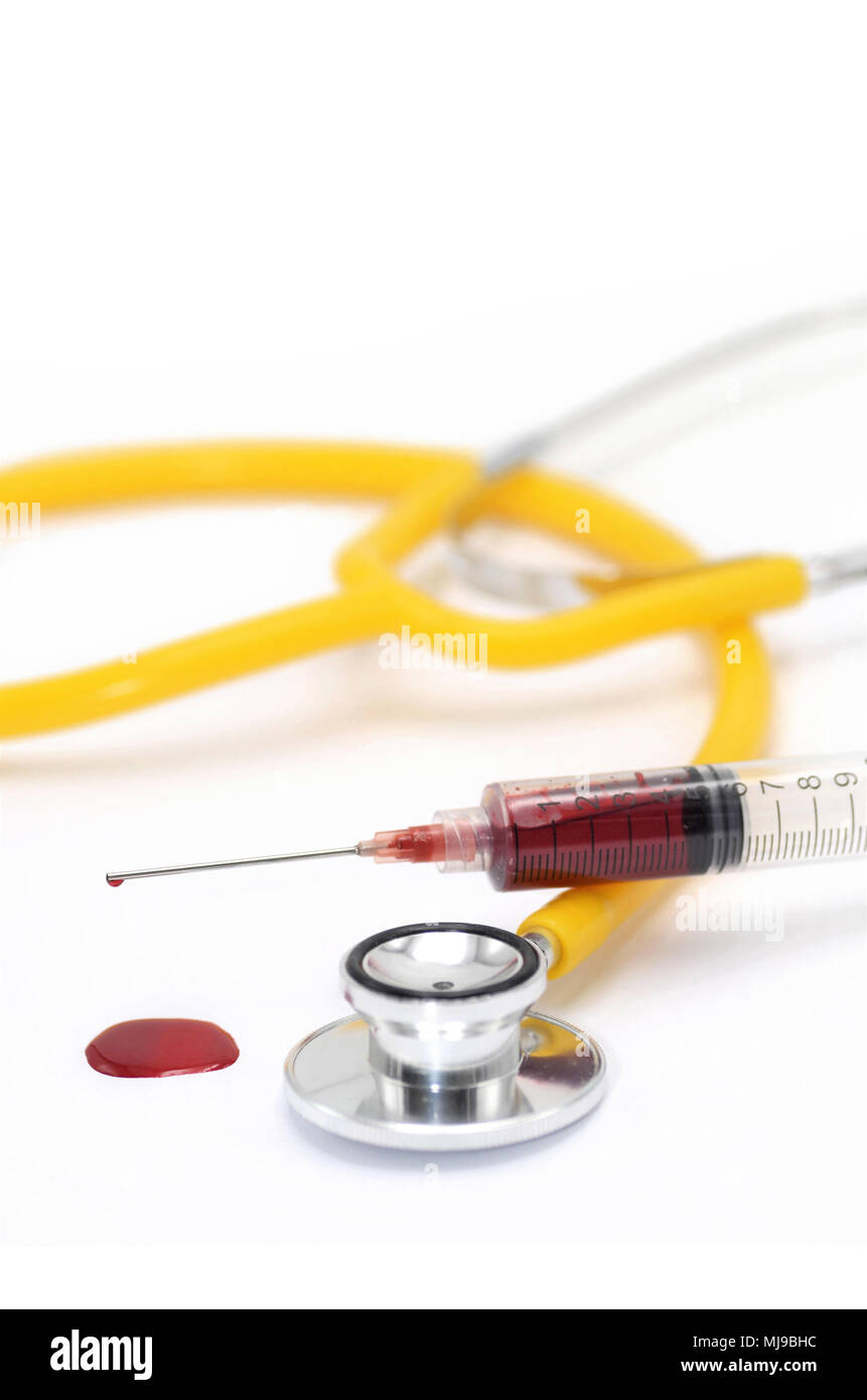 Syringe with stethoscope isolated on white background Stock Photo - Alamy