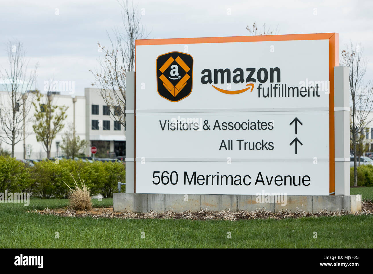 A logo sign outside of a Amazon fulfillment center in Middletown