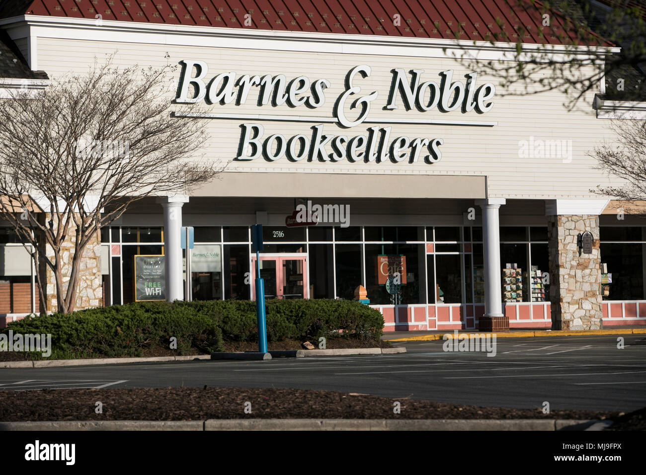 A logo sign outside of a Barnes & Noble Booksellers store ...