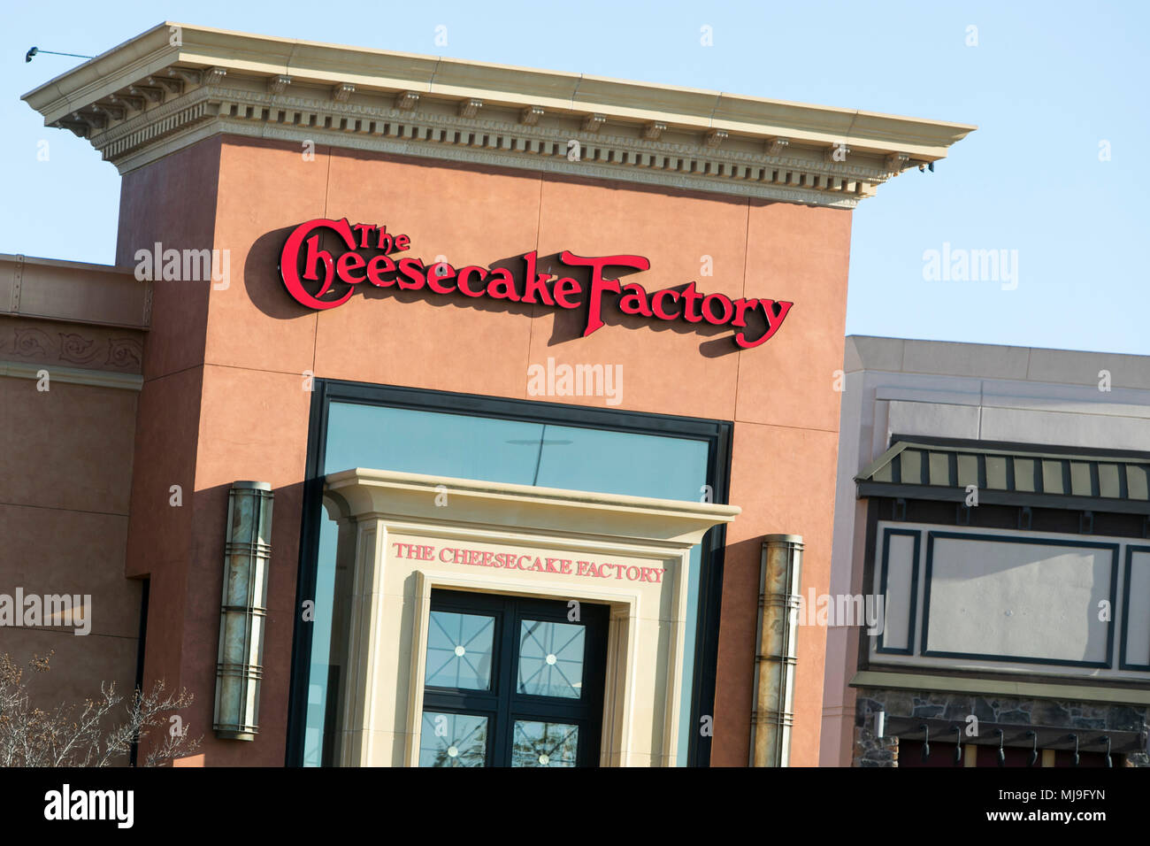 A logo sign outside of a Cheesecake Factory restaurant location in Annapolis, Maryland on April