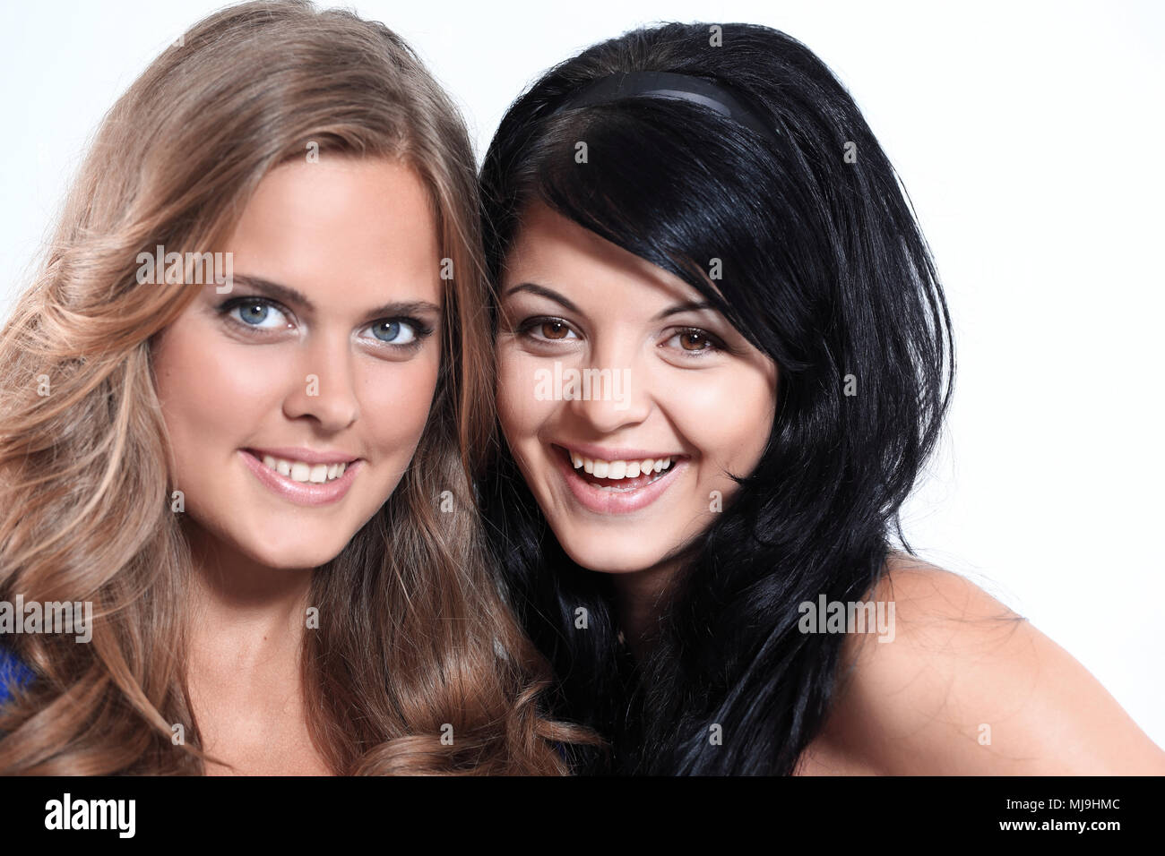Close up two girls hugging other hi-res stock photography and images ...
