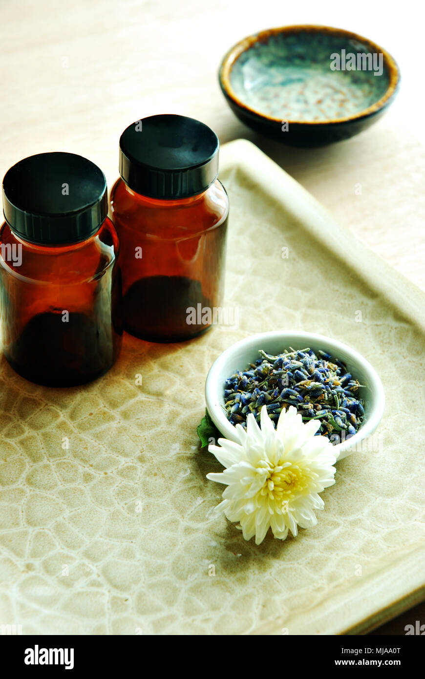 bottles of essential oils with lavender flowers Stock Photo - Alamy