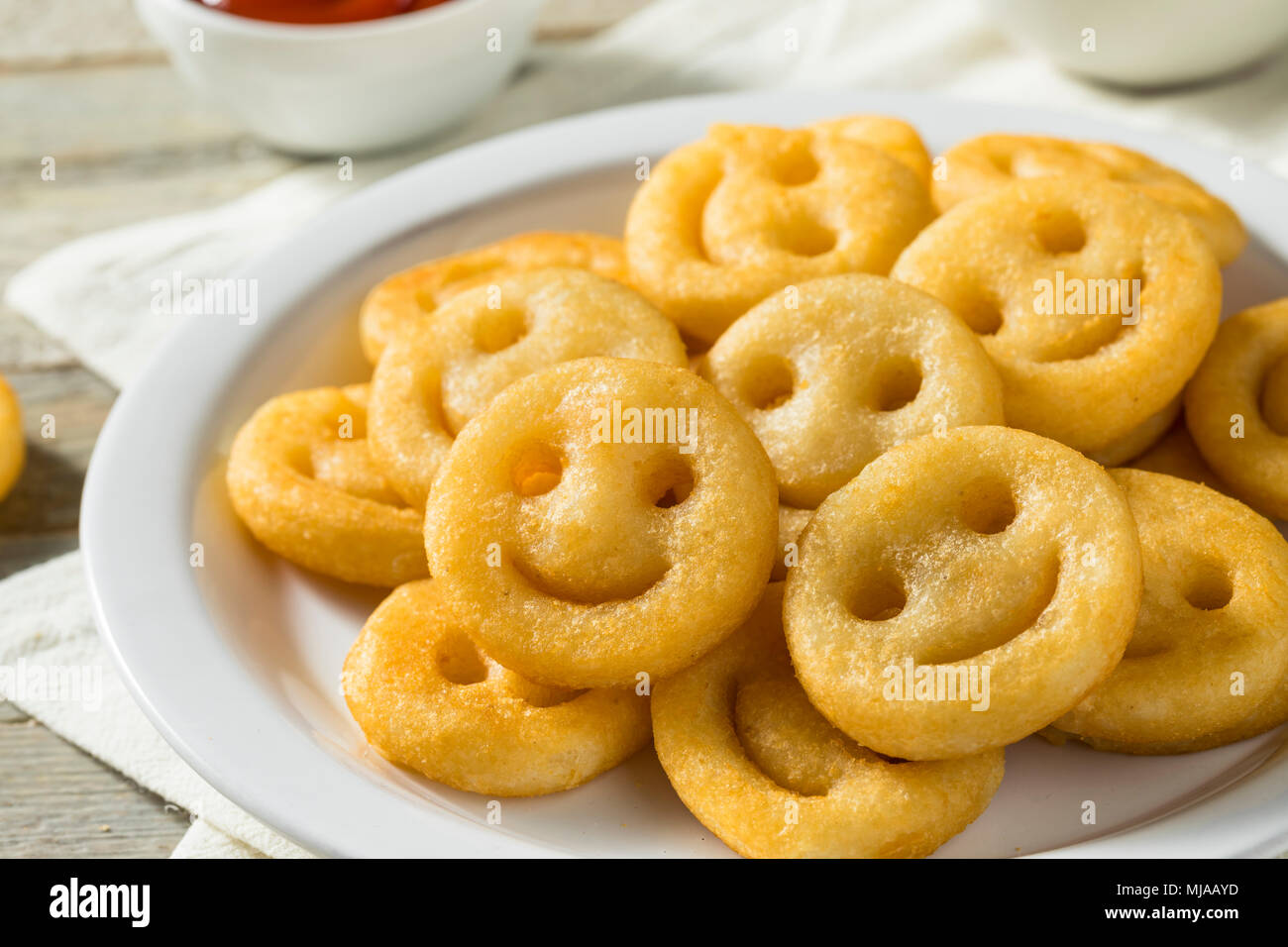 Homemade Smiley Face French Fries with Ketchup Stock Photo