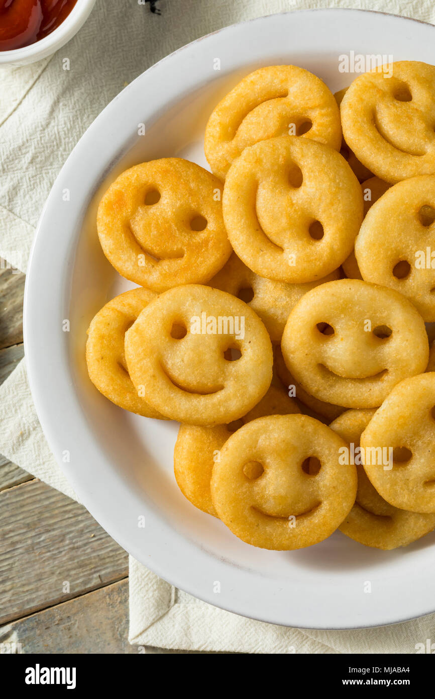 Homemade Smiley Face French Fries with Ketchup Stock Photo