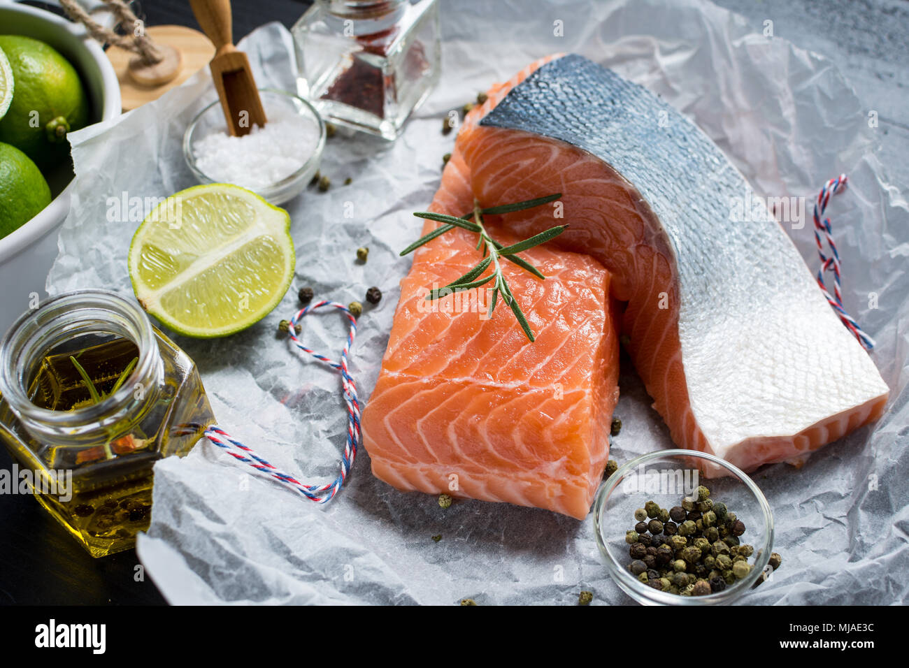 Raw Salmon Fillet with Aromatic Herbs and Spices Stock Photo - Alamy