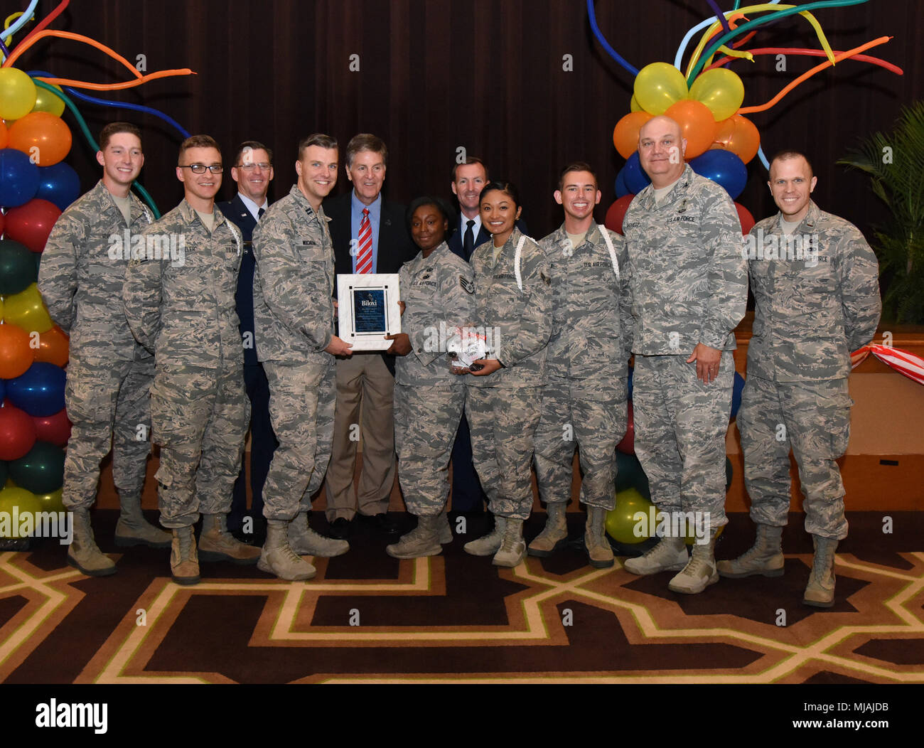 Members of the Keesler Air Force Base Fishbowl Student Ministry Center  White Rope Program pose for a photo after accepting the Military Group  Volunteer of the Year award during the 35th Annual