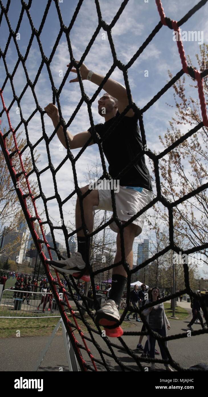 PHILADELPHIA – 18-year-old Liam Kunkel, a student athlete for North Shore  High School in Glen Head, New York, participates in the Marine Corps  Battles Won Challenge during the Penn Relays at Franklin