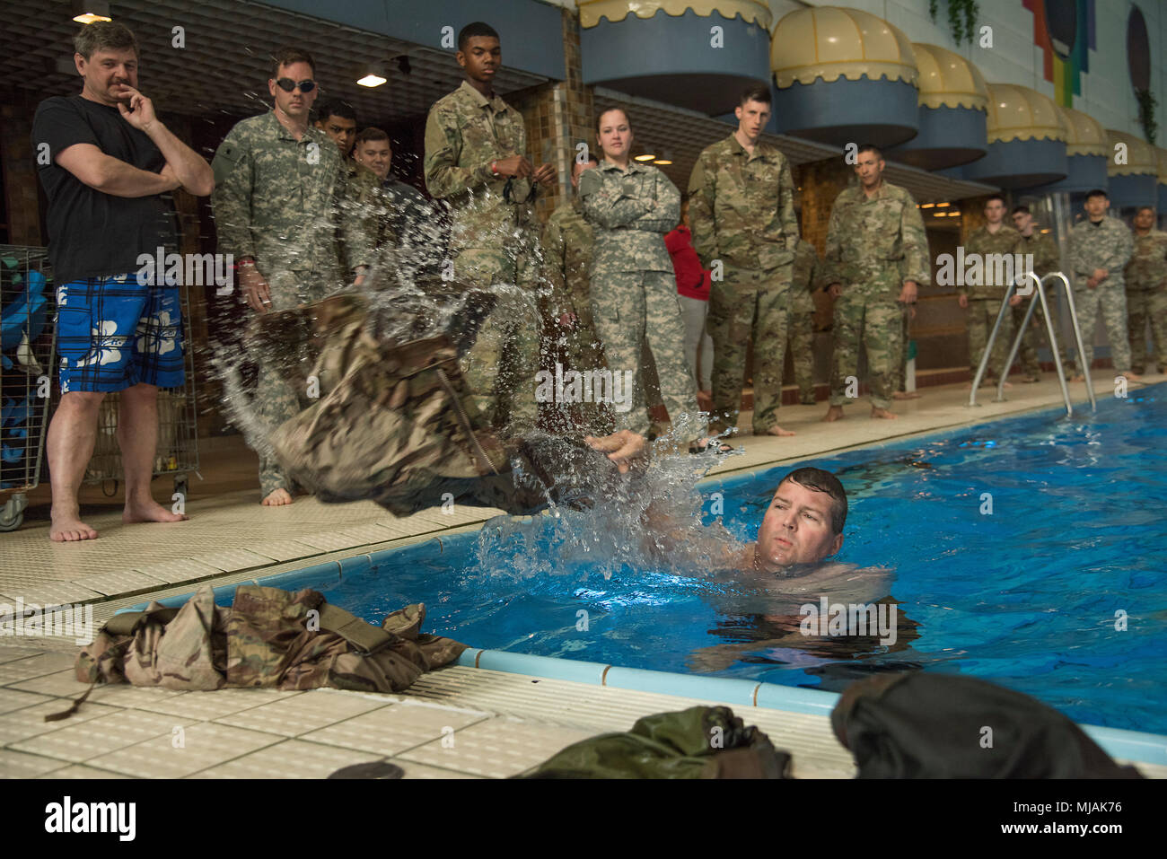 U.S. Army Soldiers assigned to 66th Military Intelligence Brigade compete  in various tasks as sprinting, 1000m-run, chin up test, swimming in  uniform, weapon qualification and others to obtain the German Armed Forces