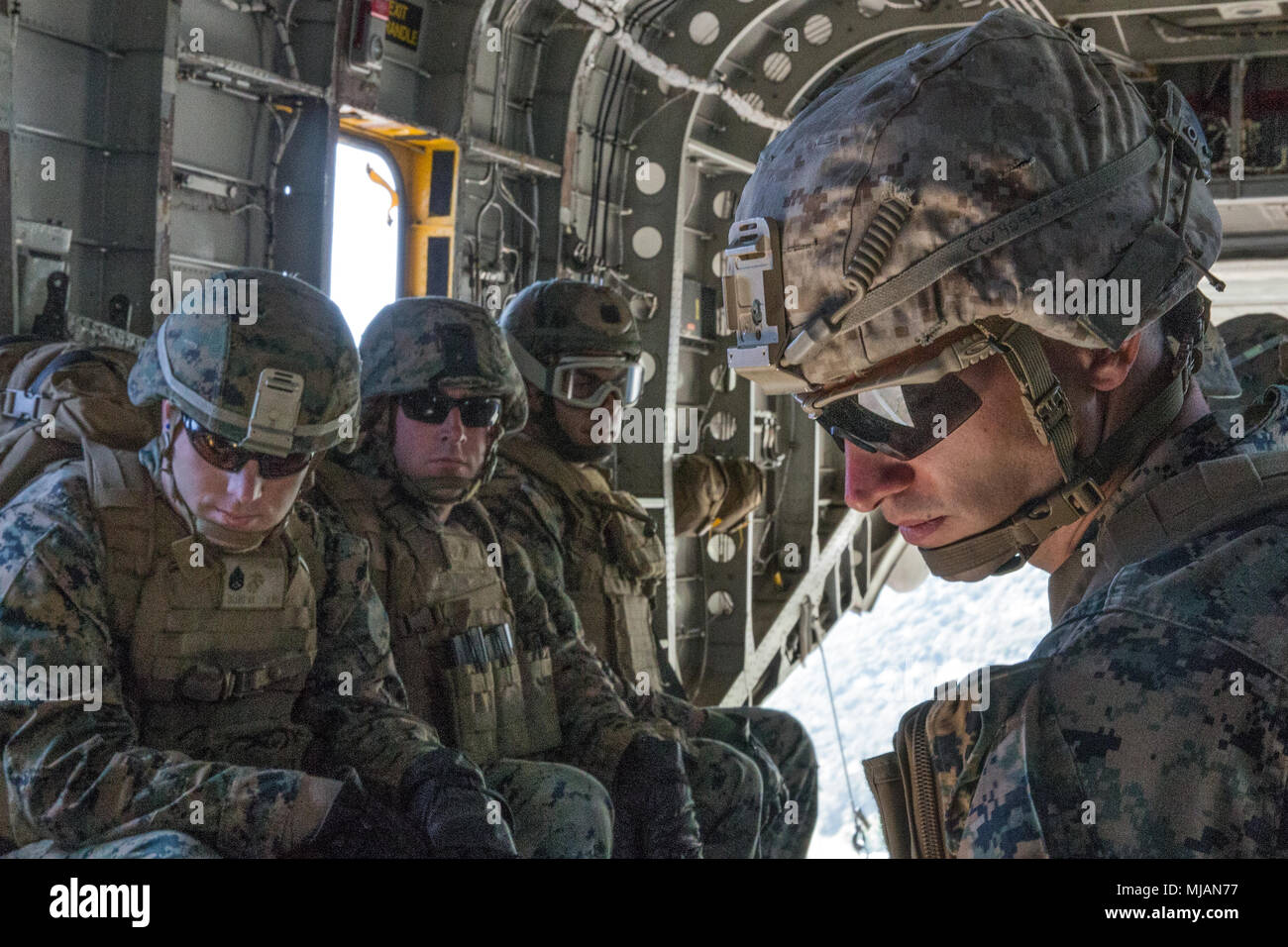 U.S. Marines prepare to rappel from a CH-53E Super Stallion during a ...