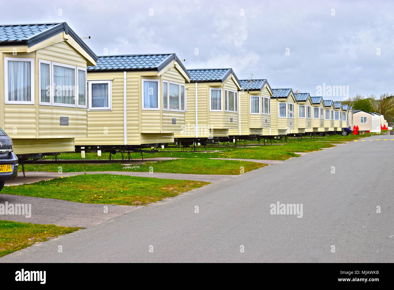 A line of modern static holiday caravans at Trecco Bay Holiday Park, Porthcawl ,S.Wales. This well-kept & run park is now owned by Parkdean Resorts. Stock Photo