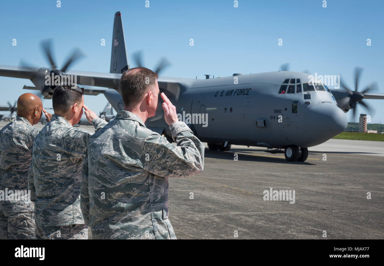 From Left, Chief Master Sgt. Elvin Young, 374th Airlift Wing Command
