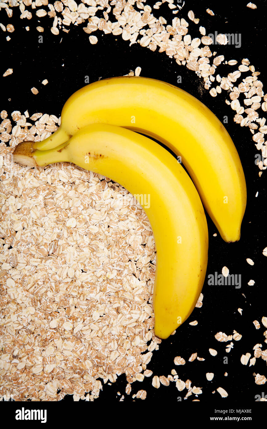 two bananas with oats Stock Photo - Alamy - Advantages Of Eating Bananas With Oats