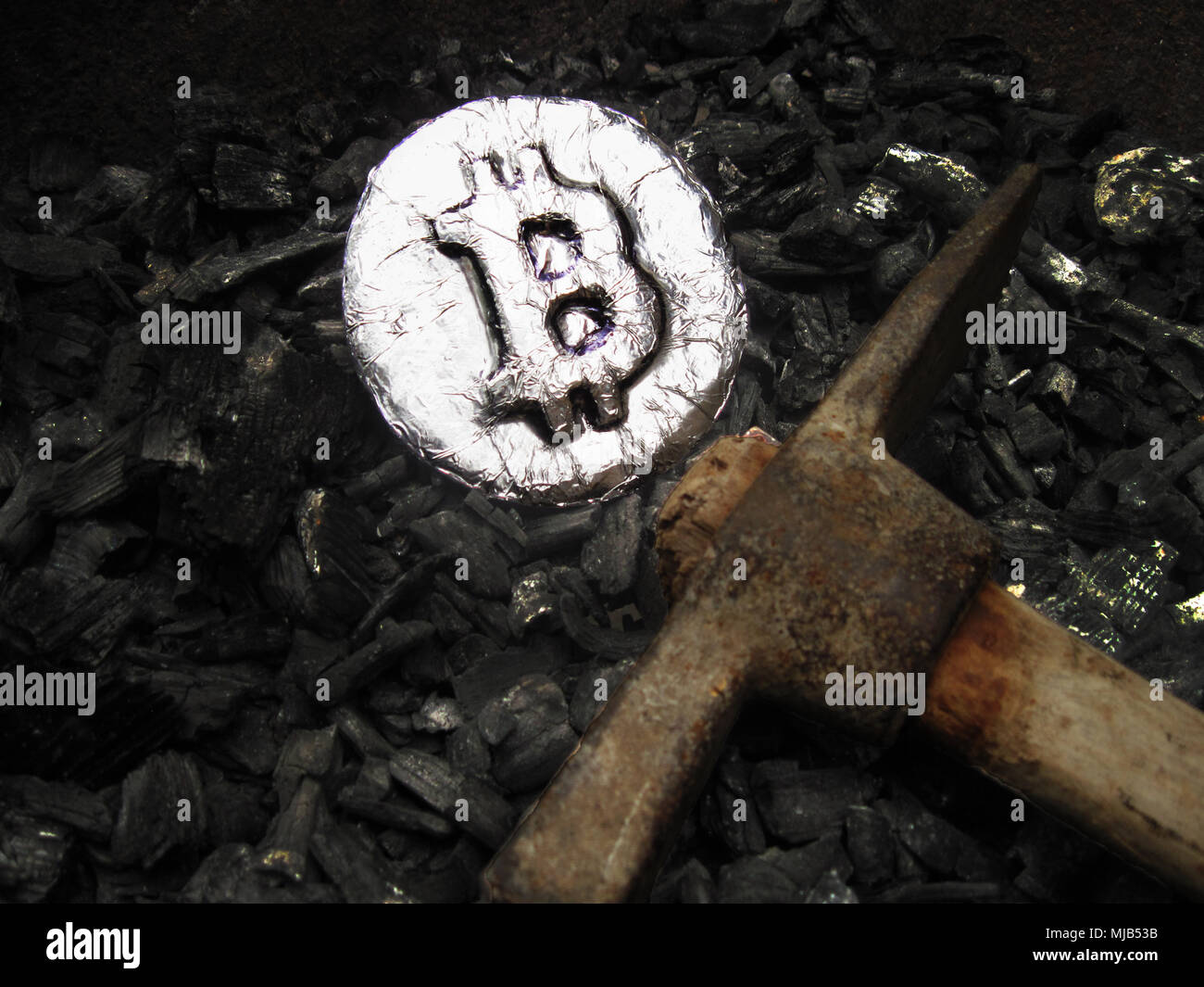 Bitcoin real metal coin is on one hundred dollars bills or banknotes. It  means hot price or value and high exchange rate of crypto currency on  market Stock Photo - Alamy