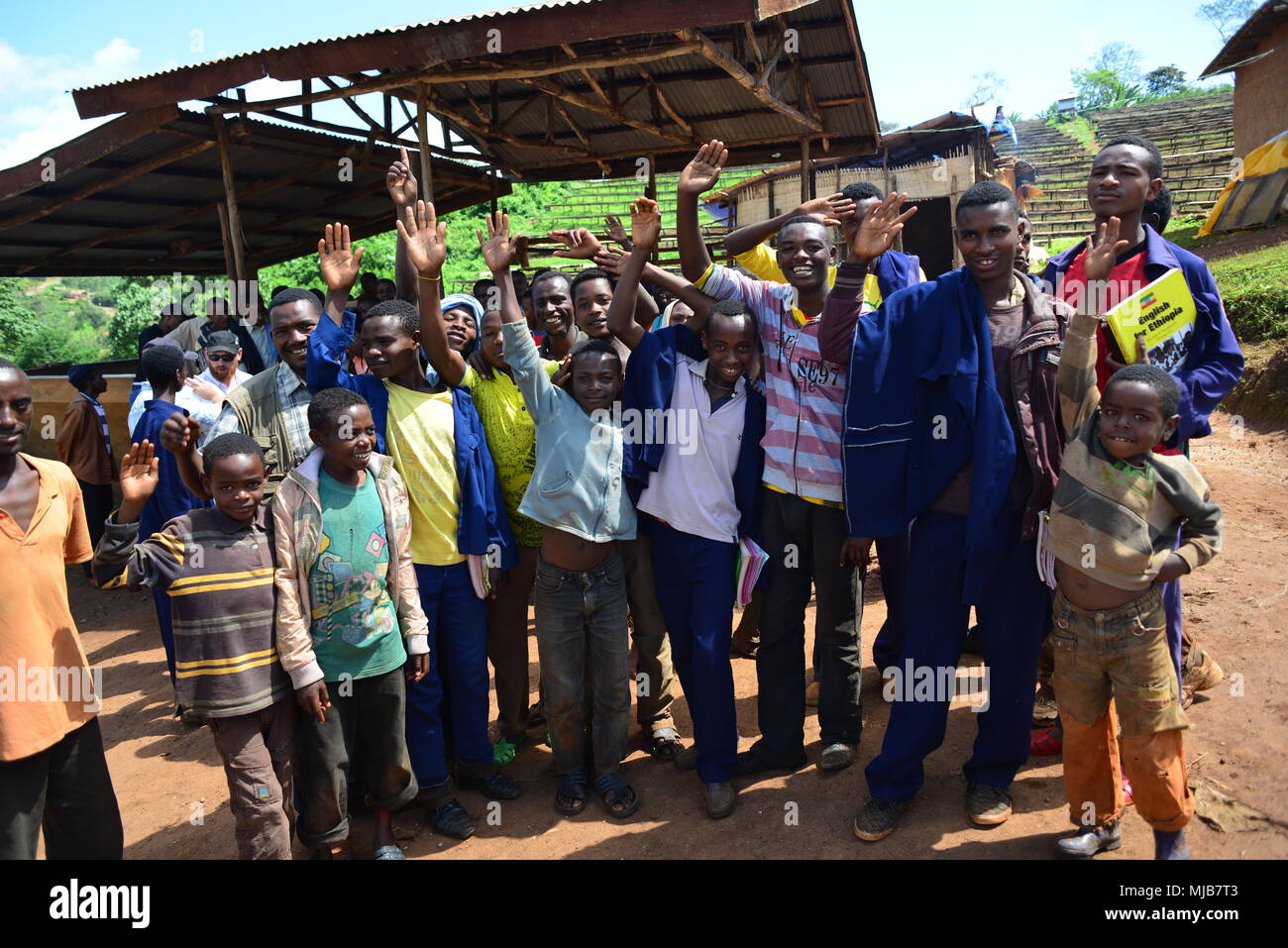 A group of schoolboys,  at a coffee processing mill, Sidama coffee region, Ethiopia Stock Photo