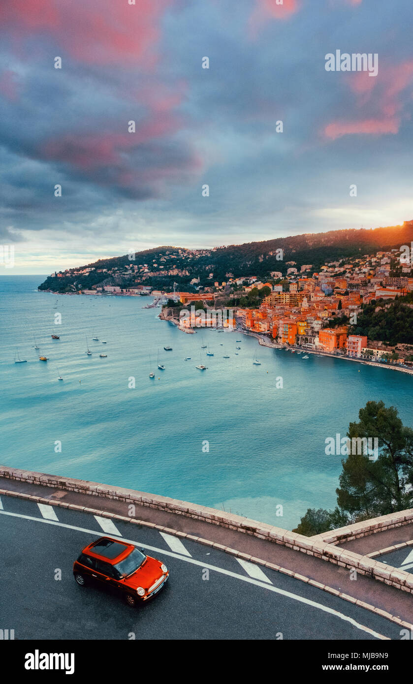 Road and car above Villefrance sur Mer in French Riviera. Stock Photo