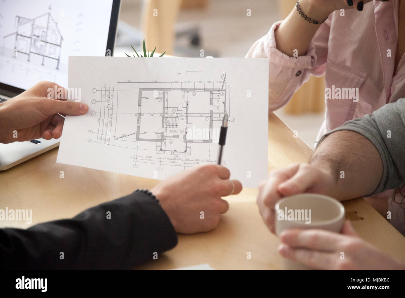 Architect, realtor or designer consulting couple with apartment Stock