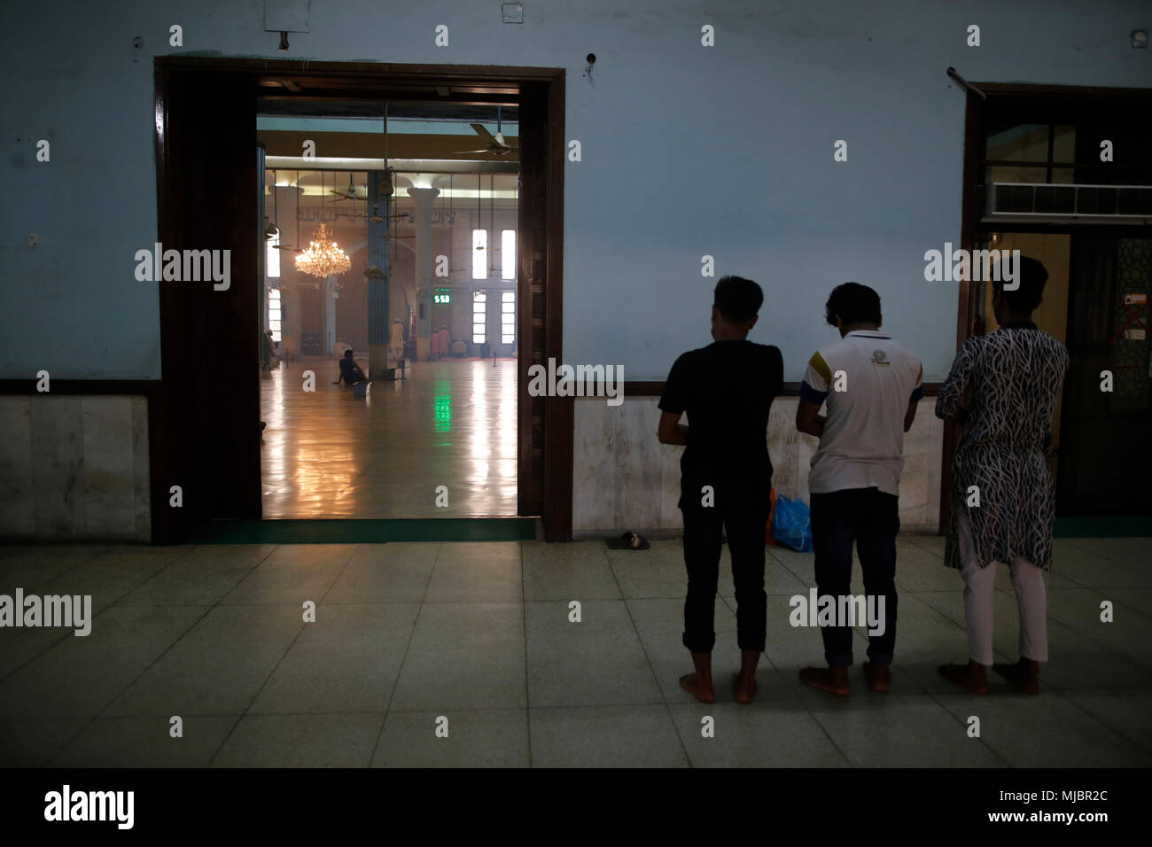 Bangladesh. Bangladeshi Muslims perform a prayer during the holy Shab-e-Barat night, known as the night of fortune at Baitul Mukarram National mosque in Dhaka, Bangladesh on May 01, 2018. Muslim devotees have been spend the night at mosques and homes offering prayers, reciting from the holy Quran and seeking blessings of Allah for long life, peace, progress and happiness for themselves, their families, relatives and friends. © Rehman Asad/Alamy Stock Photo Stock Photo