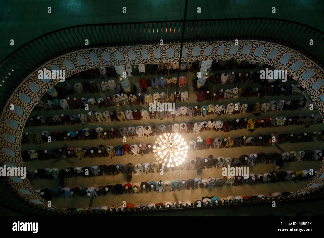 Bangladesh. Bangladeshi Muslims perform a prayer during the holy Shab-e-Barat night, known as the night of fortune at Baitul Mukarram National mosque in Dhaka, Bangladesh on May 01, 2018. Muslim devotees have been spend the night at mosques and homes offering prayers, reciting from the holy Quran and seeking blessings of Allah for long life, peace, progress and happiness for themselves, their families, relatives and friends. © Rehman Asad/Alamy Stock Photo Stock Photo