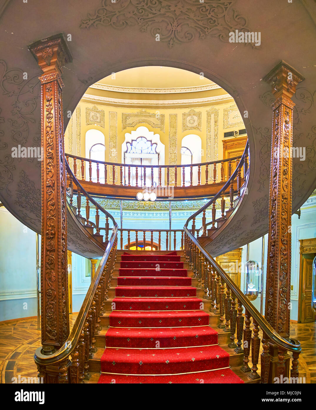 TEHRAN, IRAN - OCTOBER 24, 2017: Beautiful carved wooden staircase well  complement interior decorated with stucco, Glass and Ceramic Museum, on  Octob Stock Photo - Alamy