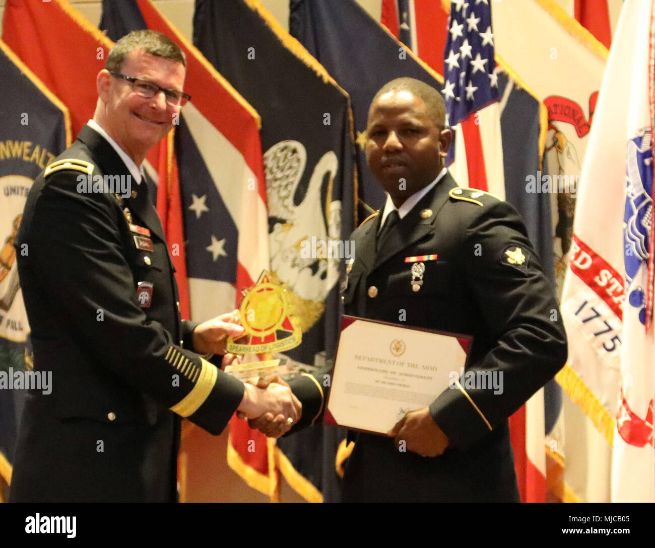 Brig. Gen. Jeffrey W. Drushal (left), chief of transportation and commandant, U.S. Army Transportation School, presented the best 2017 Transportation Reserve Soldier, Ricardo Thomas, 840th Transportation Battalion, Camp Arifjan, Kuwait, during the U.S. Army Transportation Corps annual regimental honors ceremony May 1 at Wylie Hall on Fort Lee, Virginia. The ceremony was held as part of the U.S. Army Combined Arms Support Command Sustainment Week branch day activities. Stock Photo