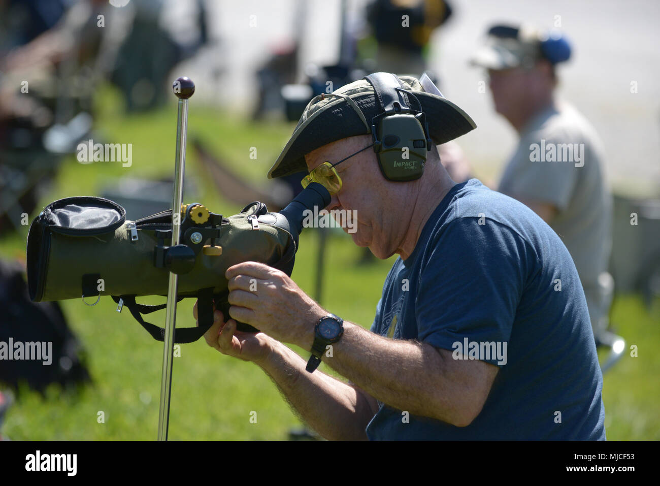 Stacey Winfield checks targets with a scope during the 2018 Eastern Civilian Marksmanship