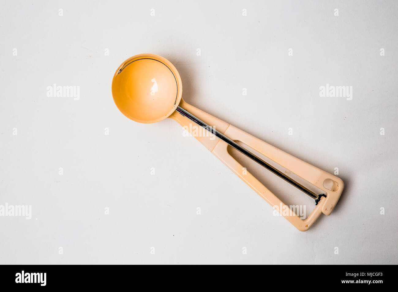 Spring release icecream scoop spoon isolated Stock Photo Alamy