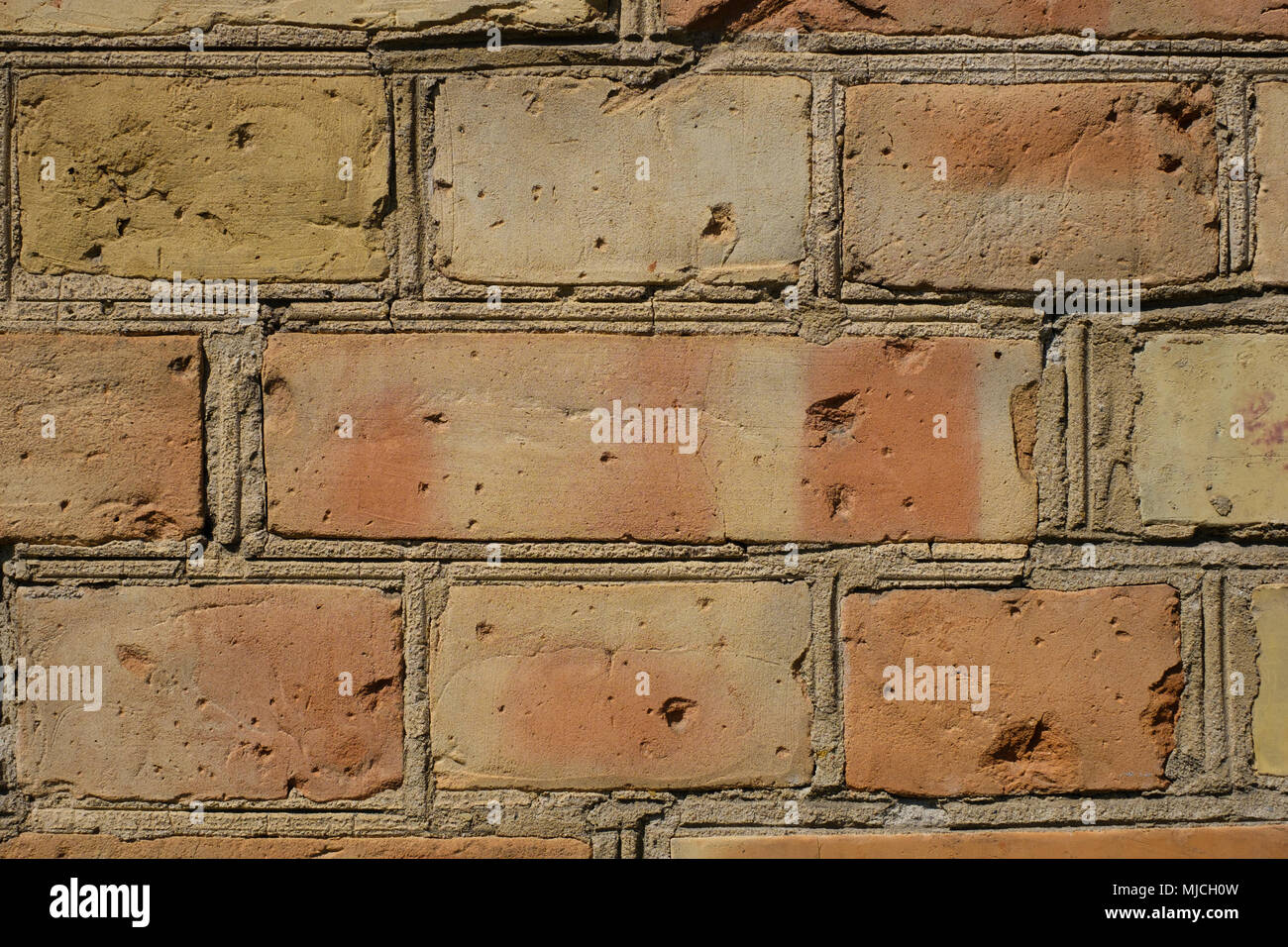 brick in the wall - brick wall closeup Stock Photo