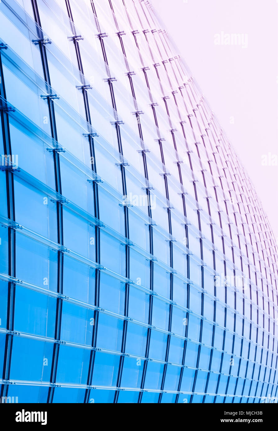 modern building facade - glass facade of skyscraper building - Stock Photo