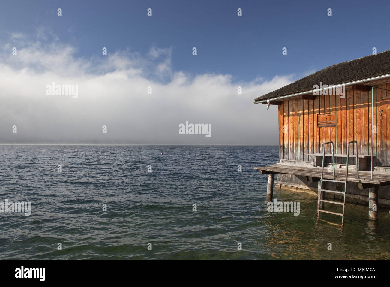 Shore of lake tegernsee in saint
