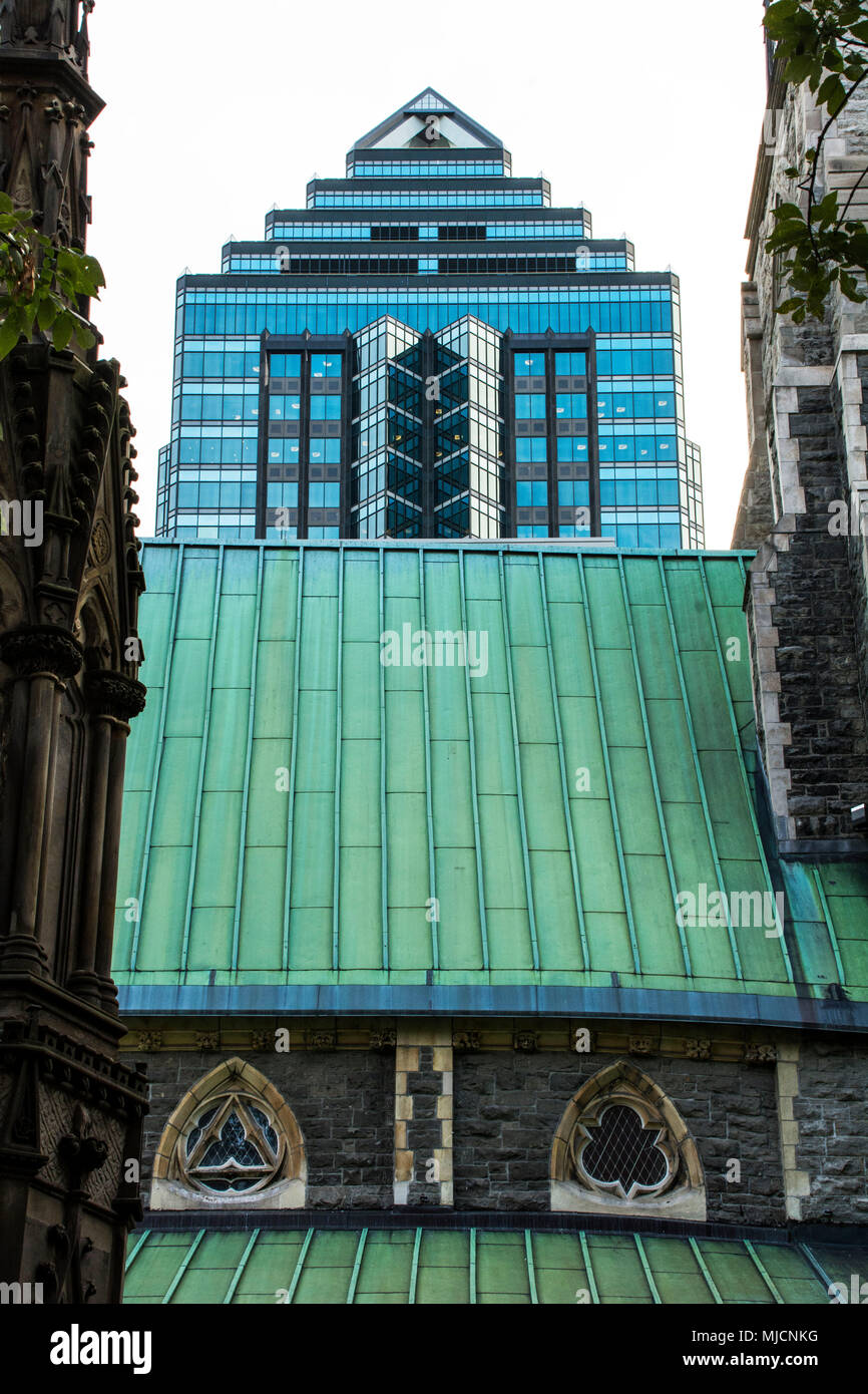 Church roof and high rise in Montreal Stock Photo