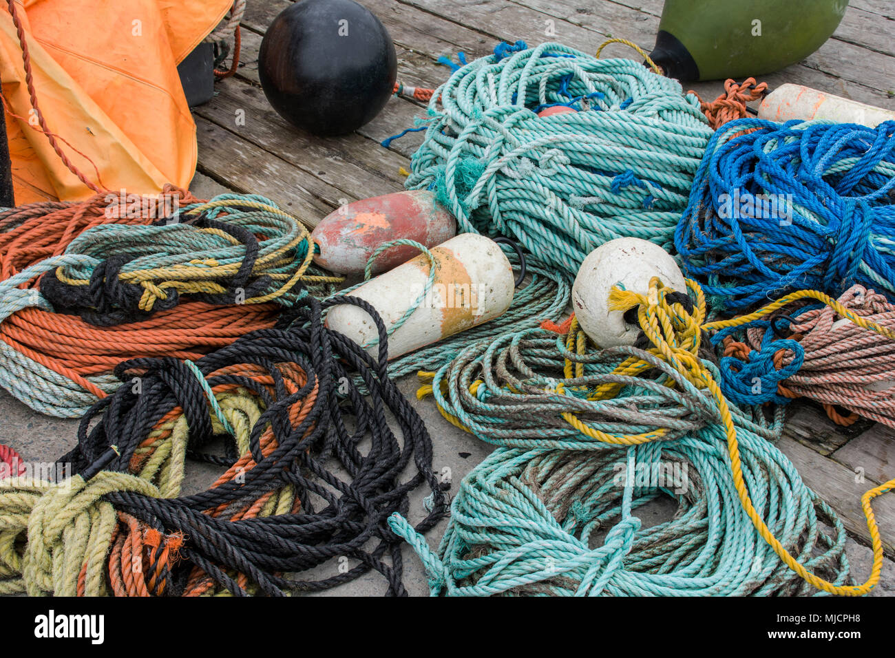 Coloured ropes in the fishing harbour of Peggy's Cove near Halifax in Canada Stock Photo