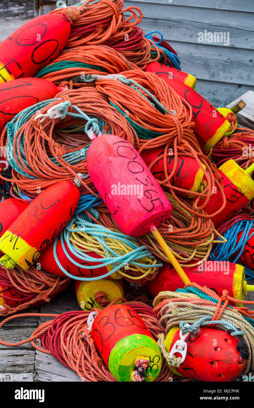 Coloured ropes and buoys in the fishing harbour of Peggy's Cove near Halifax in Canada Stock Photo
