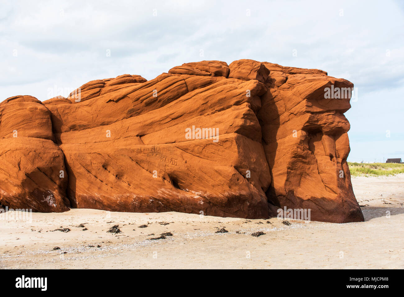 Red cliffs on the south dune on the Magdalen Island of 'Cap-aux-Meules' in Canada Stock Photo